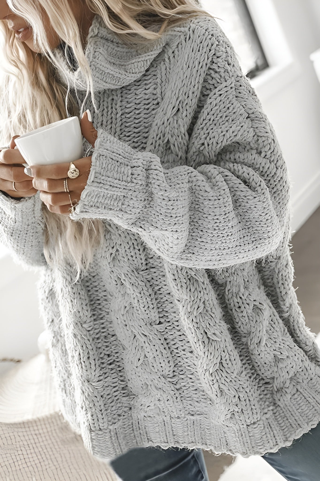 Oversized knitted high collar jumper